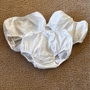3 plastic training pants covers. Size 2T